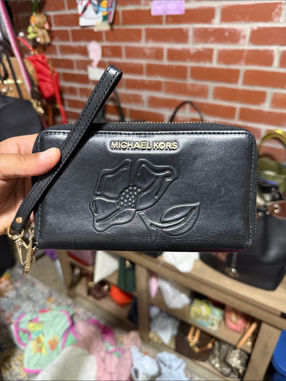 Michael Kors Black Flower Embossed Zip Wristlet